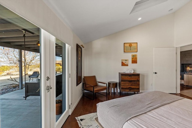 bedroom with french doors, vaulted ceiling, dark hardwood / wood-style floors, and access to outside