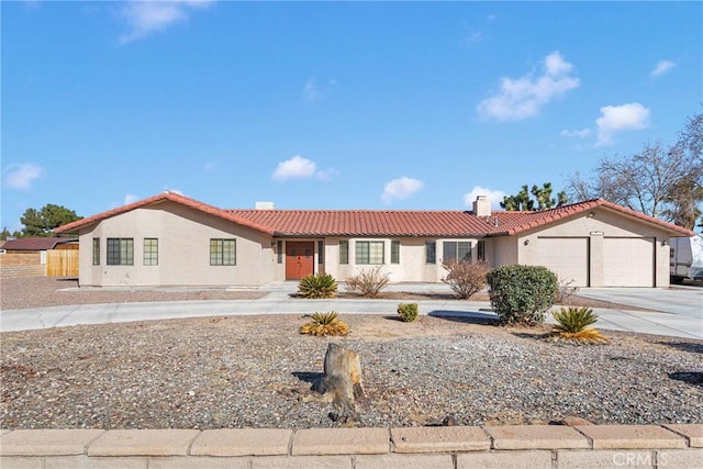 ranch-style house featuring a garage