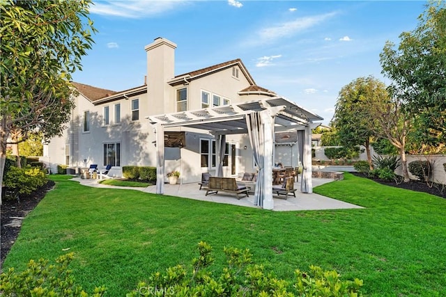 rear view of house with a yard, a patio area, and a pergola