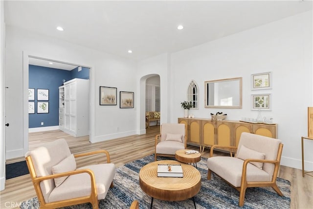 sitting room featuring light hardwood / wood-style floors