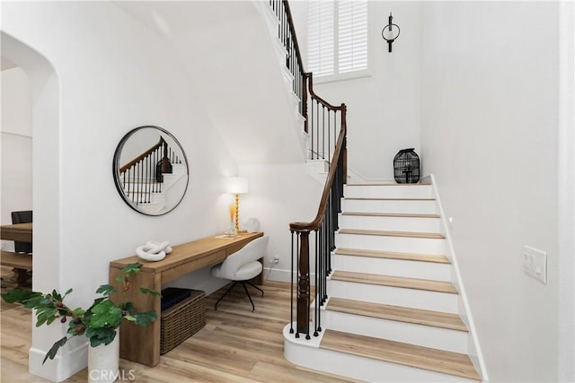 stairway with wood-type flooring