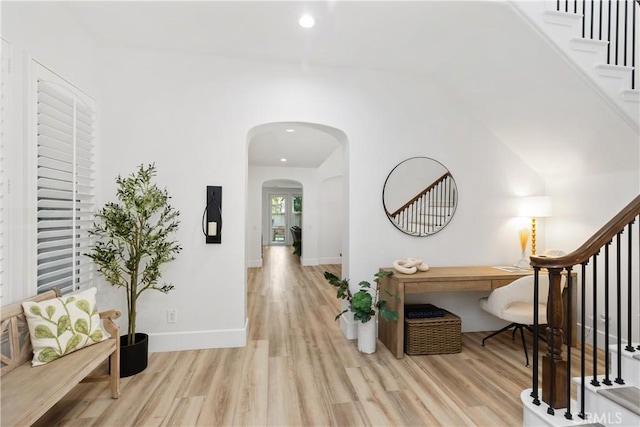 hall with light hardwood / wood-style floors