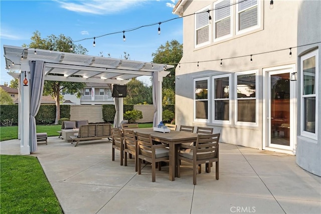 view of patio featuring an outdoor hangout area and a pergola