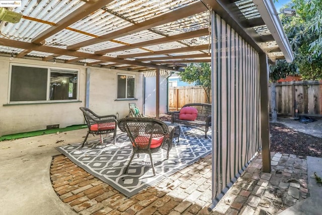 view of patio featuring a pergola