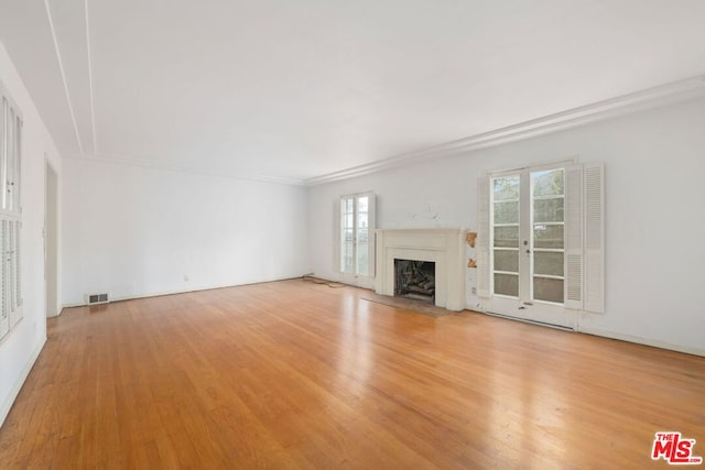 unfurnished living room featuring light wood-type flooring