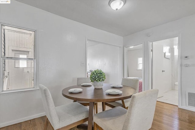 dining room featuring hardwood / wood-style floors