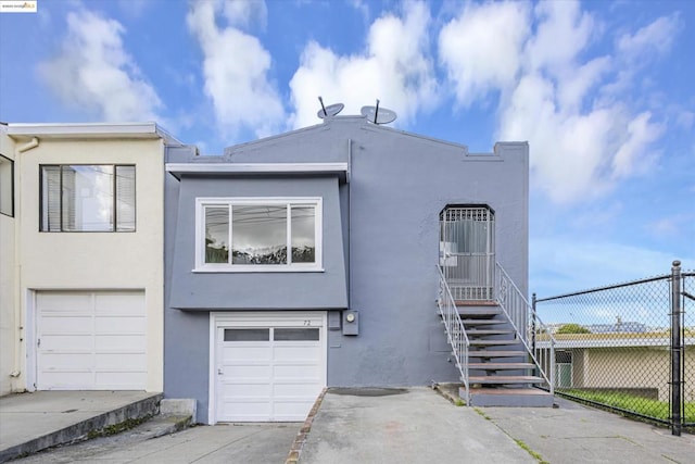 view of front of house with a garage