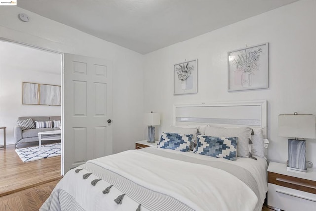 bedroom featuring wood-type flooring