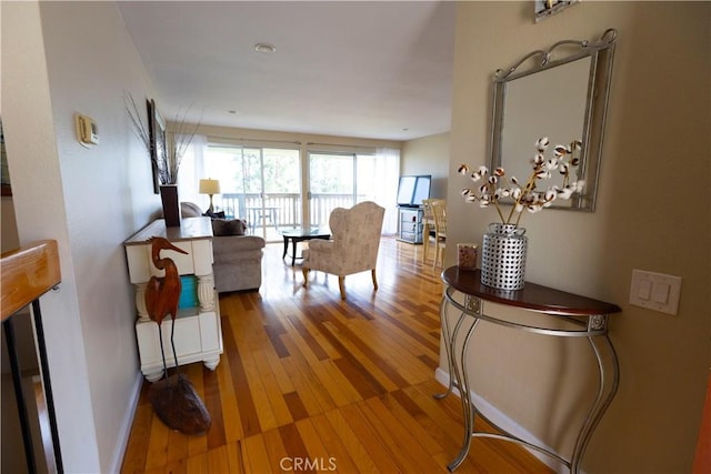 hallway featuring hardwood / wood-style flooring