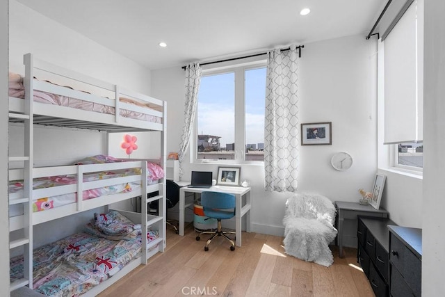 bedroom with light hardwood / wood-style floors