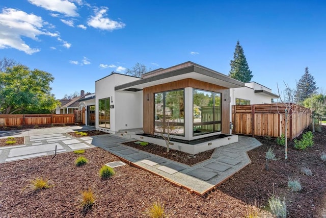 back of house featuring a patio area