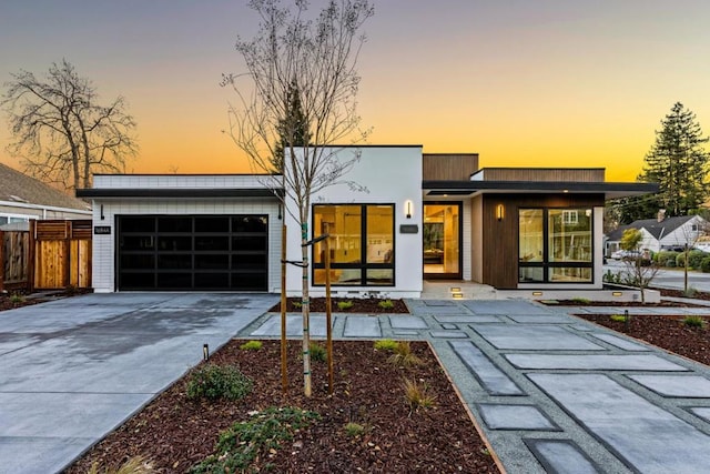 modern home featuring a garage