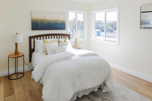 bedroom featuring wood-type flooring