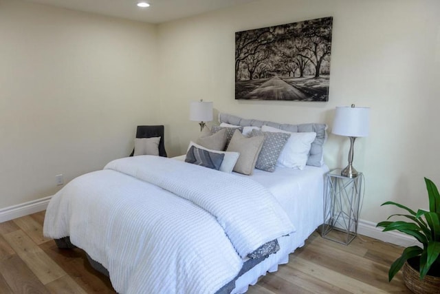 bedroom featuring hardwood / wood-style flooring