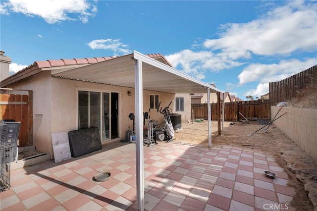 view of patio with cooling unit