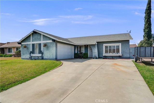 single story home with a garage and a front lawn