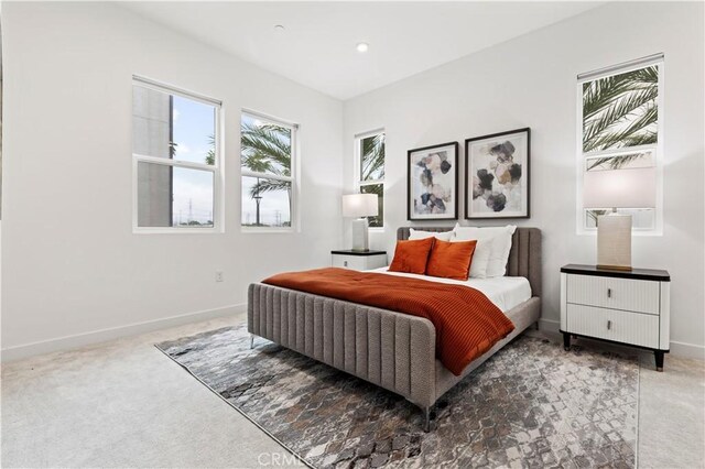 bedroom featuring dark carpet