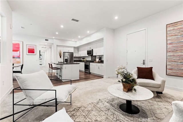 living room featuring hardwood / wood-style floors