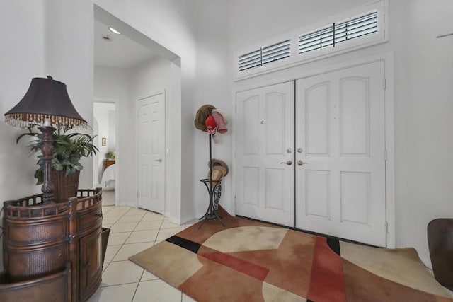 view of tiled foyer entrance