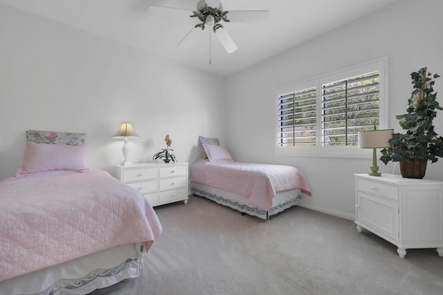 bedroom featuring ceiling fan and light colored carpet