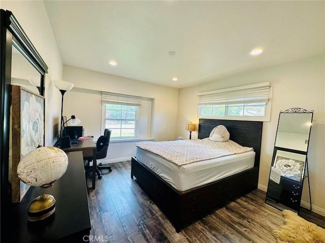 bedroom featuring dark hardwood / wood-style floors