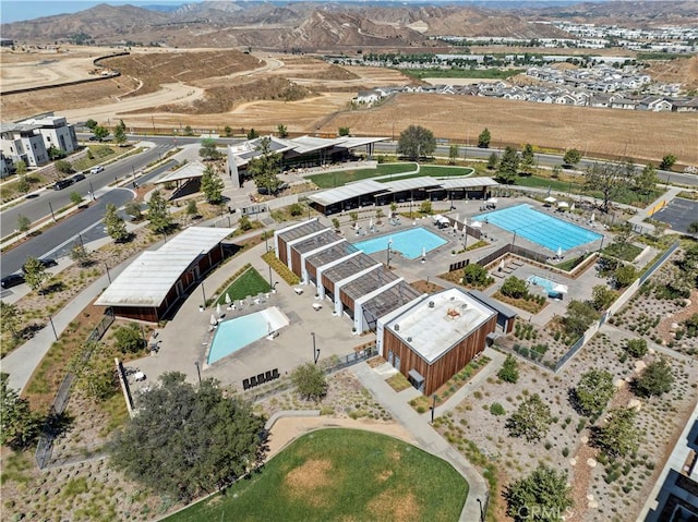 drone / aerial view featuring a mountain view