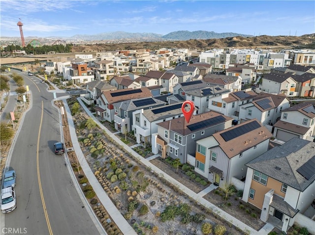 drone / aerial view with a residential view and a mountain view