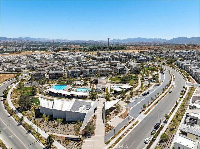 drone / aerial view with a residential view and a mountain view