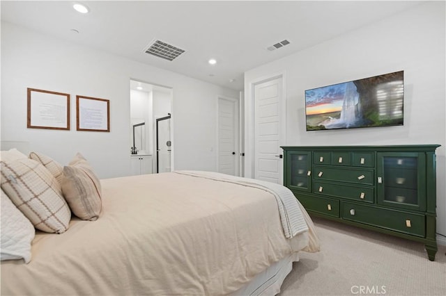 bedroom featuring recessed lighting, visible vents, and light colored carpet