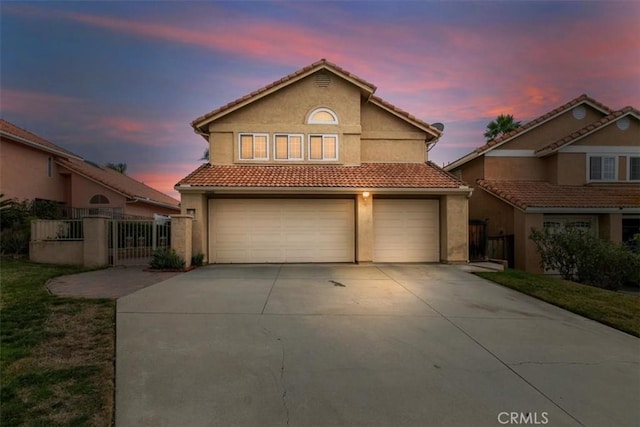 front facade with a garage