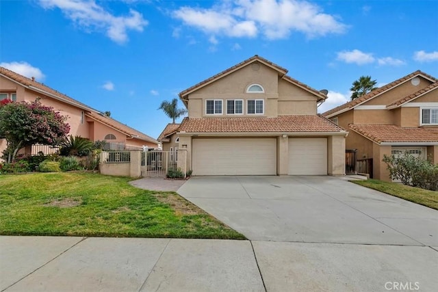 view of front property with a garage and a front yard