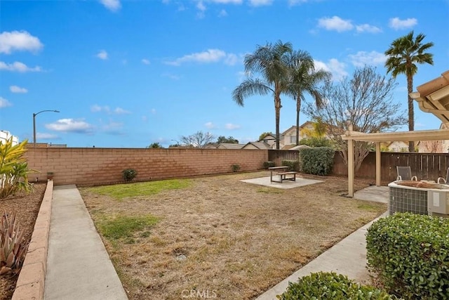 view of yard featuring a patio and central air condition unit