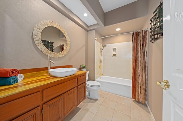 full bathroom with toilet, tile patterned floors, shower / bathtub combination with curtain, and vanity