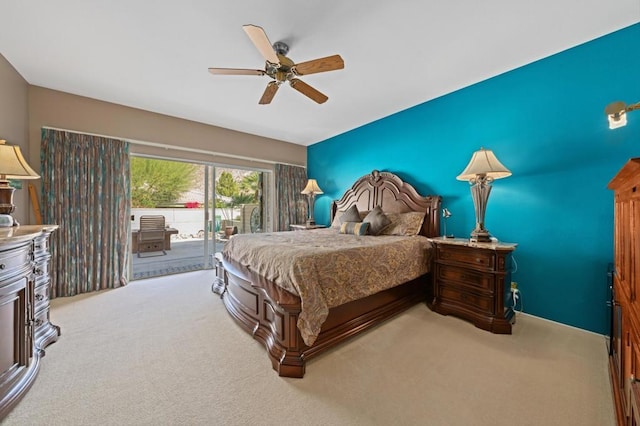 carpeted bedroom featuring access to outside and ceiling fan