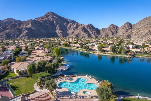 bird's eye view featuring a water and mountain view