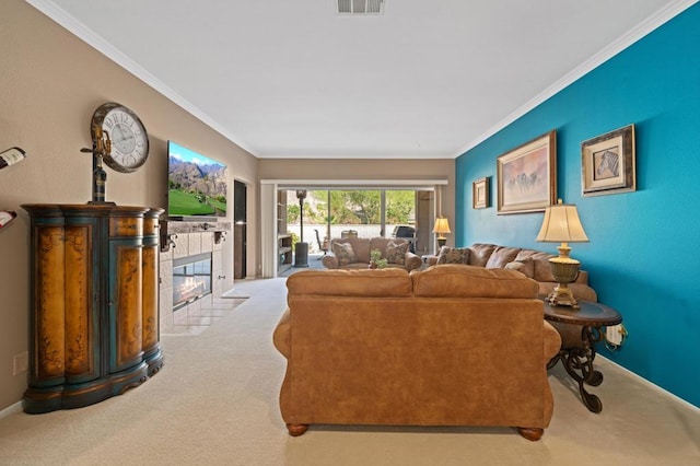 carpeted living room featuring crown molding and a fireplace