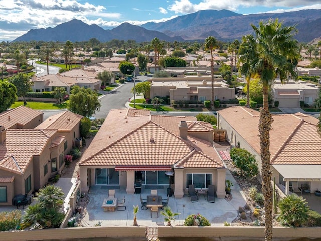 bird's eye view with a mountain view