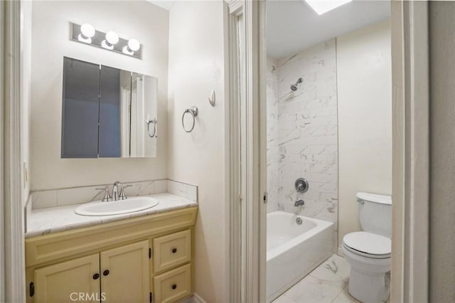 full bathroom with tiled shower / bath combo, vanity, and toilet