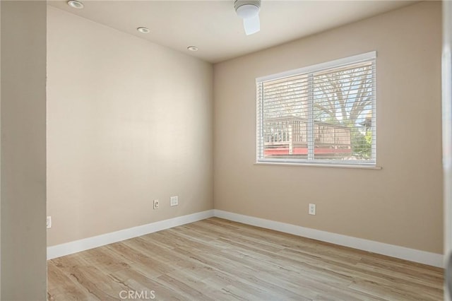 unfurnished room featuring light hardwood / wood-style flooring