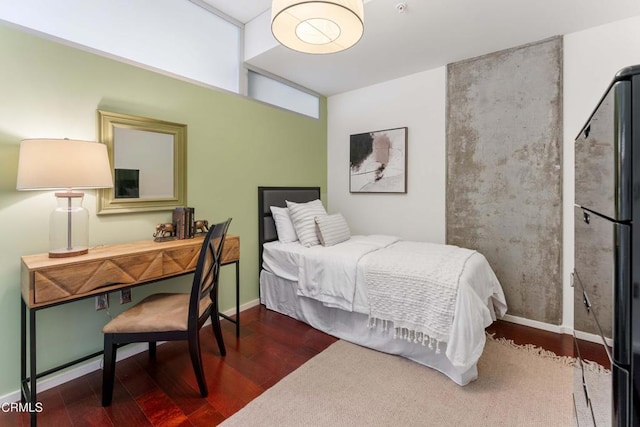 bedroom featuring wood-type flooring