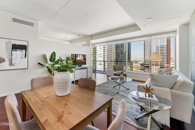 dining area featuring hardwood / wood-style floors