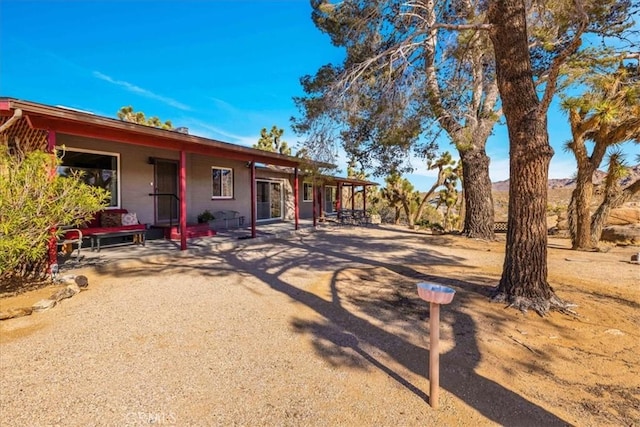 view of front of home featuring a patio area