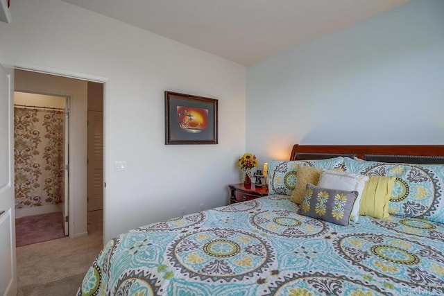 bedroom with light colored carpet