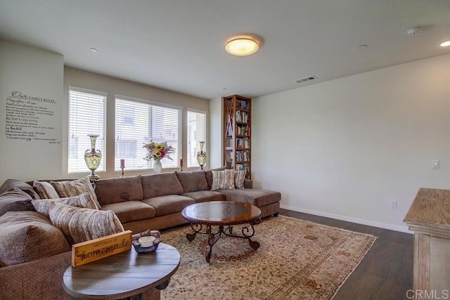 living room featuring dark hardwood / wood-style floors