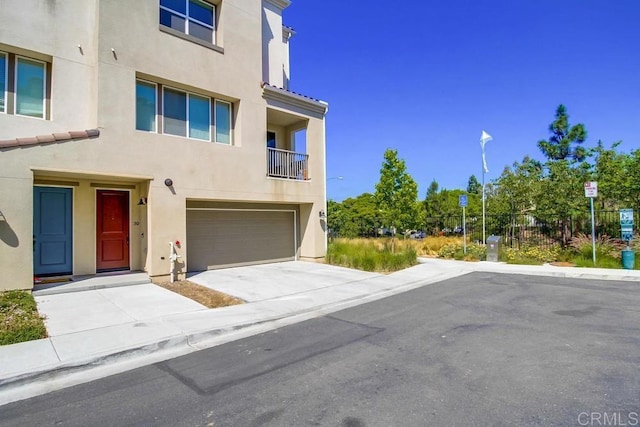 view of front of property with a garage