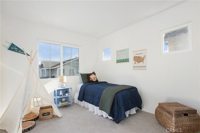 bedroom featuring carpet