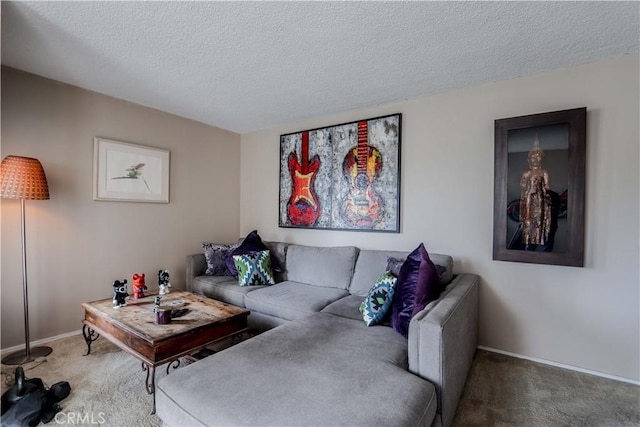 carpeted living room featuring a textured ceiling