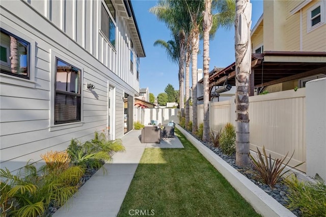 view of yard with a patio area