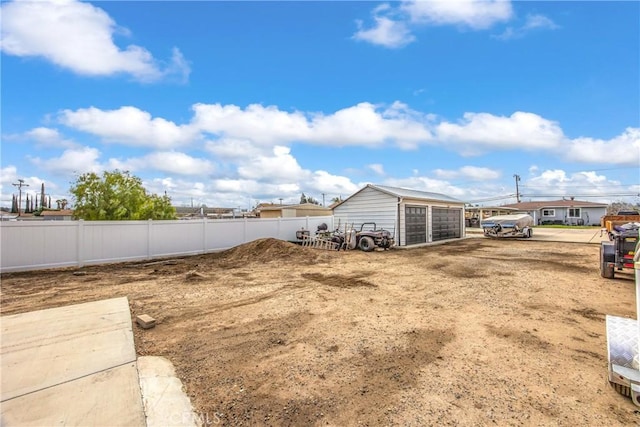 view of yard featuring a garage