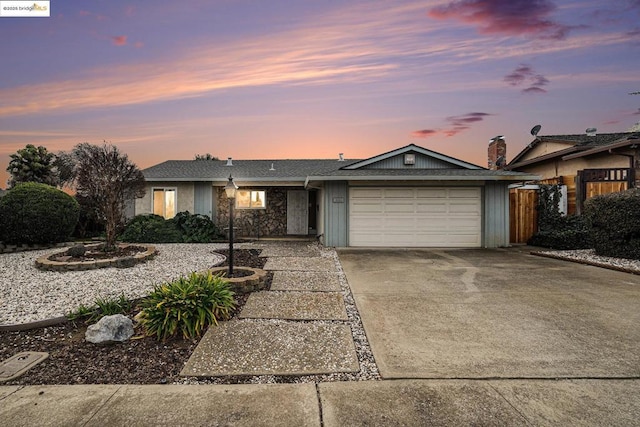 ranch-style home with a garage